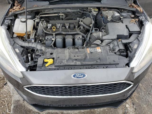 Photo 11 from auction – 2015 FORD FOCUS SE with VIN 1FADP3F29FL217194
