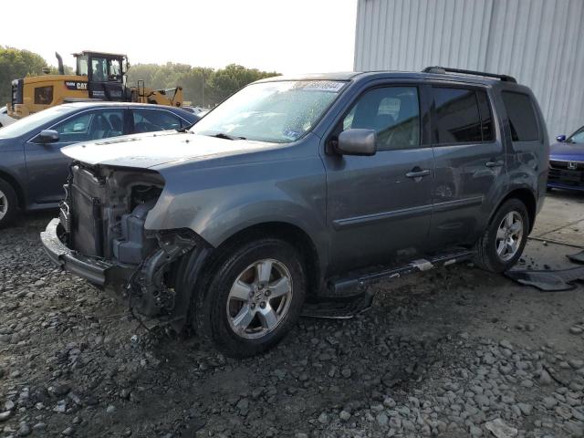HONDA PILOT EXLN 2011 with VIN 5FNYF4H73BB051698 - Photo from auction