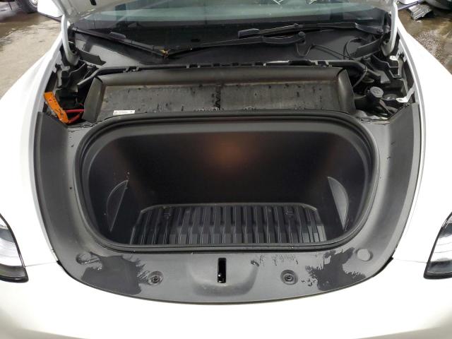 Photo 12 from auction – 2023 TESLA MODEL Y with VIN 7SAYGDEE6PF599379