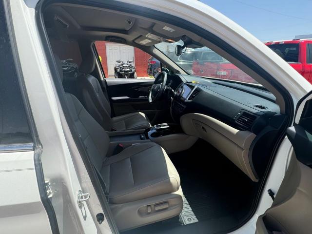 Photo 5 from auction – 2017 HONDA PILOT TOUR with VIN 5FNYF5H94HB025126