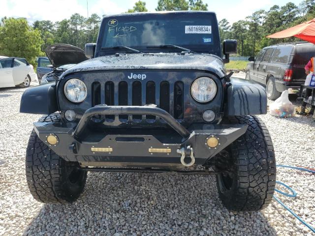 Photo 5 from auction – 2015 JEEP WRANGLER U with VIN 1C4BJWFG7FL728984