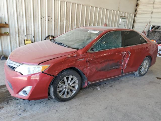 TOYOTA CAMRY HYBR 2012 with VIN 4T1BD1FK9CU039674 - Photo from auction