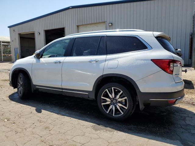 Photo 2 from auction – 2021 HONDA PILOT ELIT with VIN 5FNYF6H03MB030805