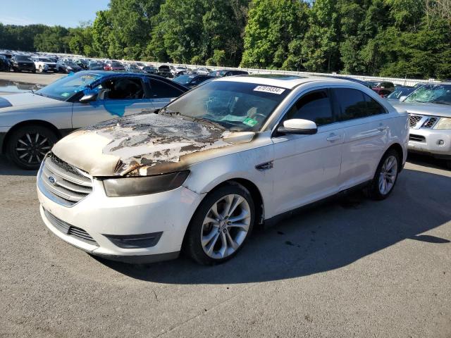 FORD TAURUS SEL 2013 with VIN 1FAHP2E83DG165715 - Photo from auction