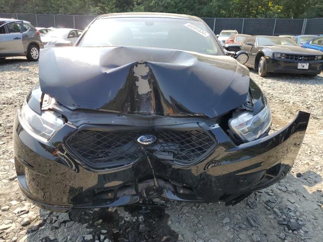 Photo 5 from auction – 2014 FORD TAURUS POL with VIN 1FAHP2MK9EG143782
