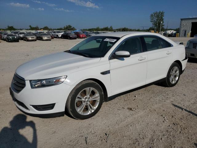 FORD TAURUS SEL 2014 with VIN 1FAHP2E81EG106776 - Photo from auction