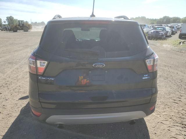 Photo 6 from auction – 2018 FORD ESCAPE SE with VIN 1FMCU9GD4JUB23031