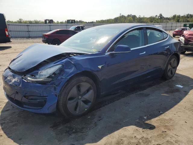 TESLA MODEL 3 2018 with VIN 5YJ3E1EB9JF064362 - Photo from auction
