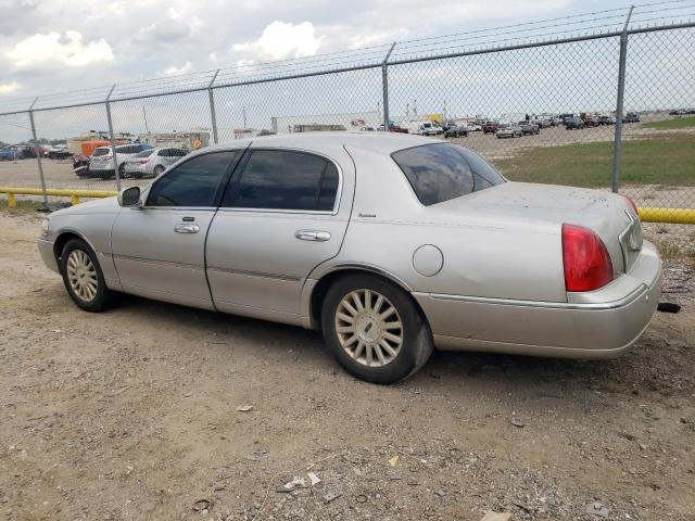 Photo 2 from auction – 2004 LINCOLN TOWN CAR E with VIN 1LNHM81W34Y611538