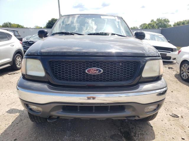 Photo 5 from auction – 2003 FORD F150 with VIN 1FTRX18LX3NA62567