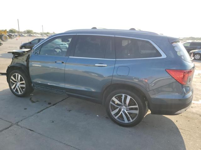 Photo 2 from auction – 2018 HONDA PILOT TOUR with VIN 5FNYF6H95JB061192