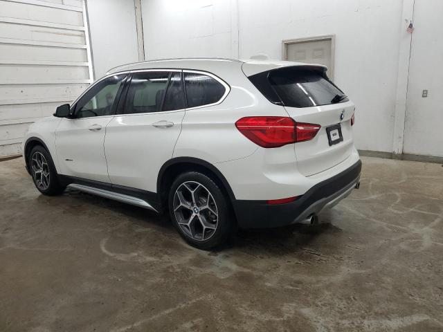 Photo 2 from auction – 2016 BMW X1 XDRIVE2 with VIN WBXHT3C33G5F66285
