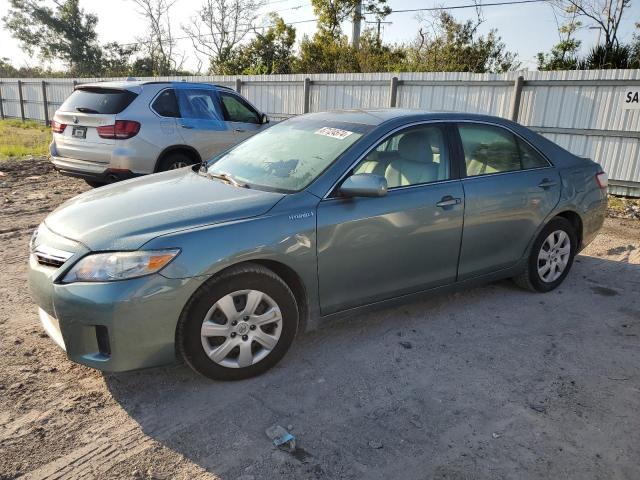 TOYOTA CAMRY HYBR 2011 with VIN 4T1BB3EKXBU143690 - Photo from auction