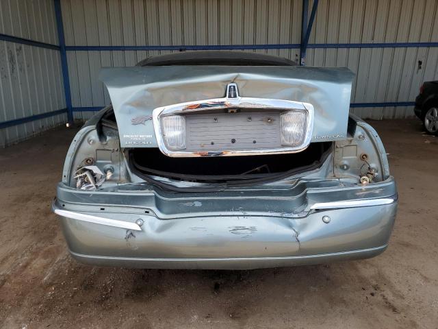 Photo 6 from auction – 2004 LINCOLN TOWN CAR E with VIN 1LNHM81W64Y620038