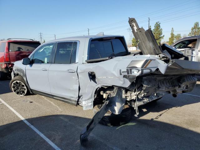 Photo 2 from auction – 2023 HONDA RIDGELINE with VIN 5FPYK3F59PB039917