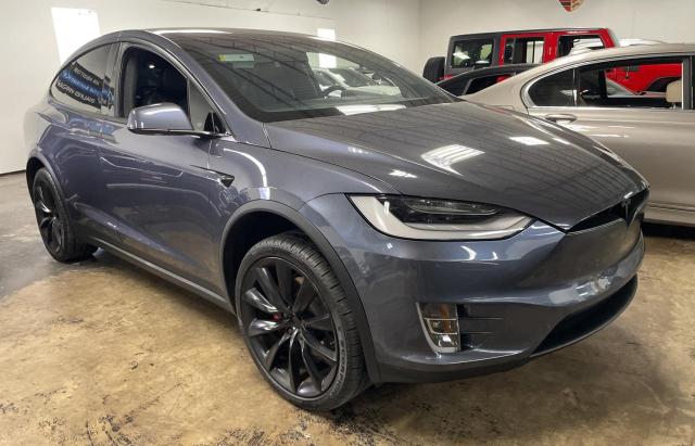 TESLA MODEL X 2020 with VIN 5YJXCDE42LF273438 - Photo from auction