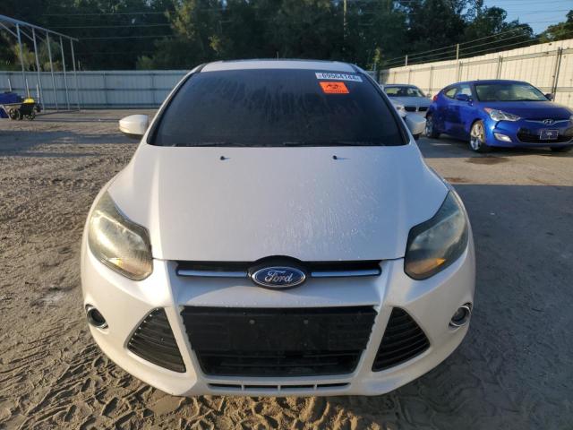 Photo 5 from auction – 2012 FORD FOCUS TITA with VIN 1FAHP3J2XCL433494