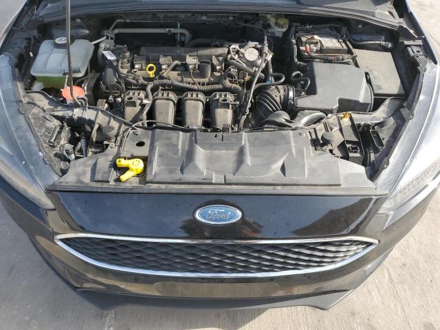 Photo 11 from auction – 2016 FORD FOCUS SE with VIN 1FADP3F27GL374286