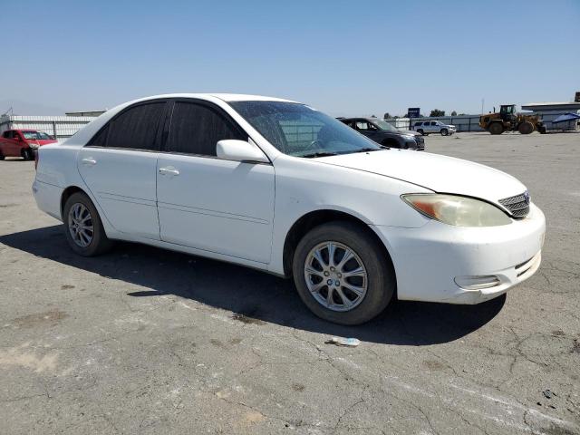Photo 4 from auction – 2002 TOYOTA CAMRY LE with VIN JTDBE32KX20010080