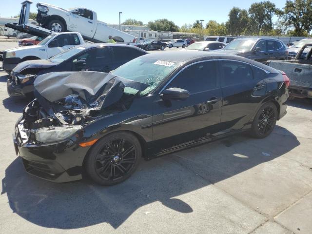 Photo 1 from auction – 2018 HONDA CIVIC LX with VIN 2HGFC2F56JH567005