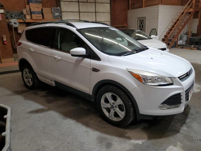 Photo 4 from auction – 2014 FORD ESCAPE SE with VIN 1FMCU9G90EUC70237