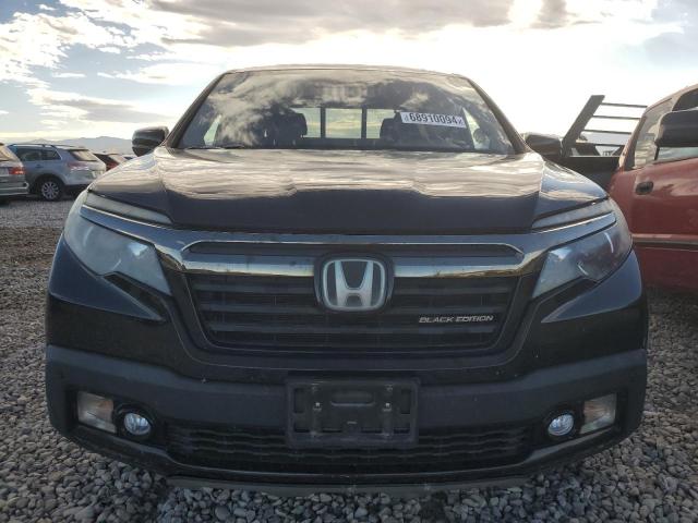 Photo 5 from auction – 2019 HONDA RIDGELINE with VIN 5FPYK3F84KB014832