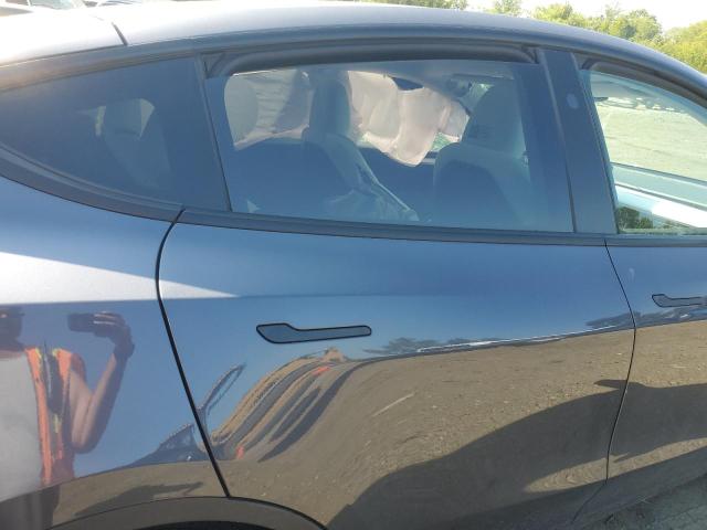 Photo 10 from auction – 2023 TESLA MODEL Y with VIN 7SAYGDED6PF930615