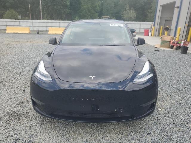 Photo 5 from auction – 2023 TESLA MODEL Y with VIN 7SAYGDEE6PA115398