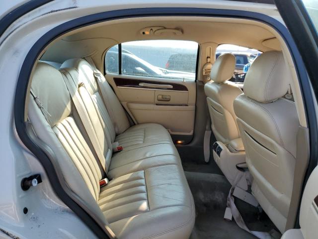 Photo 10 from auction – 2004 LINCOLN TOWN CAR E with VIN 1LNHM81W74Y682466