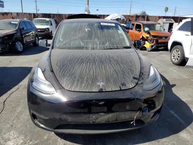 Photo 5 from auction – 2023 TESLA MODEL Y with VIN 7SAYGAEE2PF941022