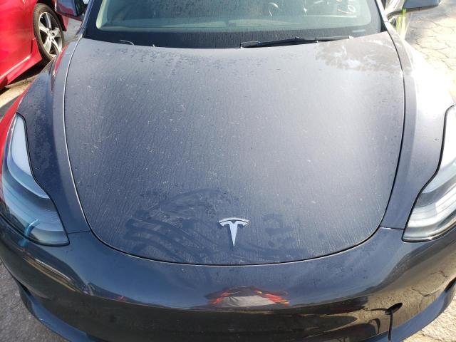 Photo 11 from auction – 2023 TESLA MODEL 3 with VIN 5YJ3E1EA4PF570231
