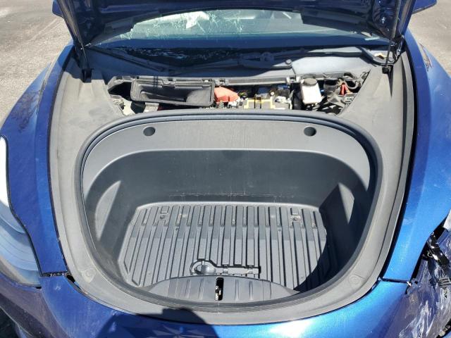 Photo 11 from auction – 2022 TESLA MODEL 3 with VIN 5YJ3E1EA6NF115135