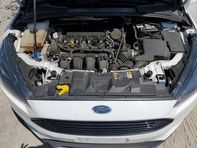 Photo 11 from auction – 2015 FORD FOCUS SE with VIN 1FADP3F29FL245786