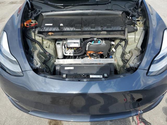 Photo 11 from auction – 2023 TESLA MODEL Y with VIN 7SAYGDEE2PA092329
