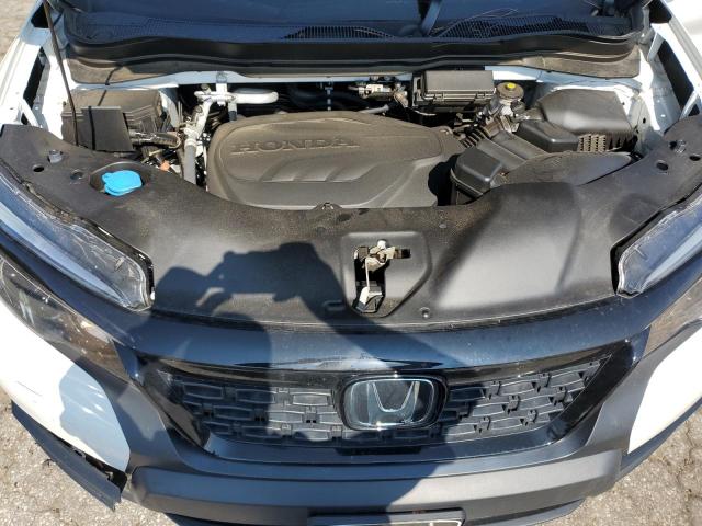 Photo 12 from auction – 2021 HONDA PASSPORT E with VIN 5FNYF8H58MB011982