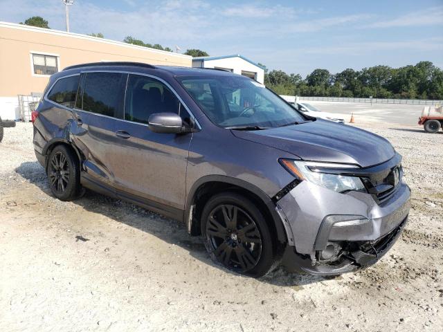 Photo 4 from auction – 2022 HONDA PILOT SE with VIN 5FNYF5H28NB009722