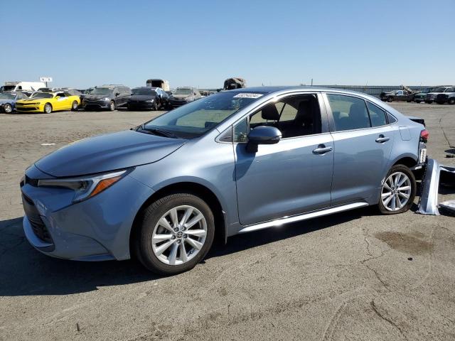 TOYOTA COROLLA LE 2023 with VIN JTDBCMFE5P3011188 - Photo from auction