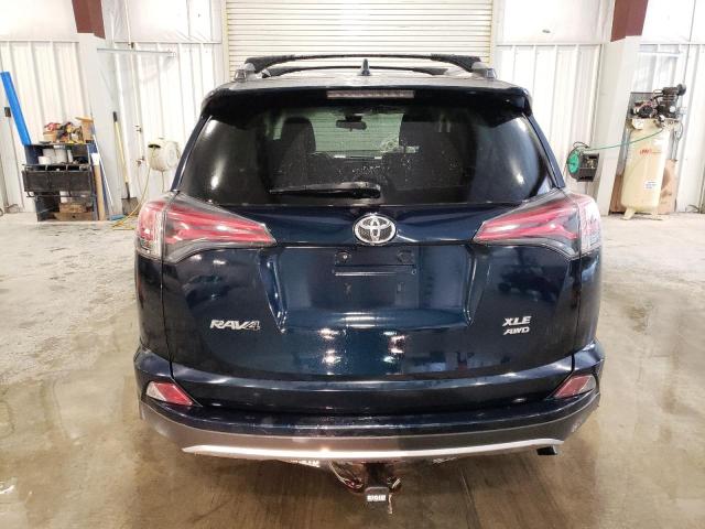 Photo 6 from auction – 2017 TOYOTA RAV4 XLE with VIN JTMRFREV9HD205593