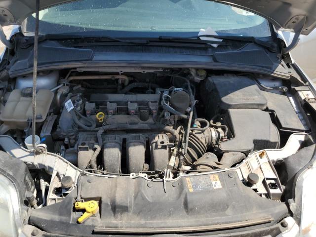 Photo 11 from auction – 2014 FORD FOCUS S with VIN 1FADP3E21EL430690