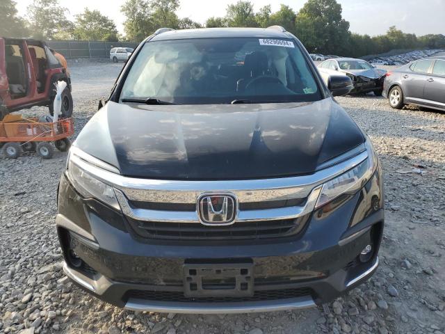 Photo 5 from auction – 2020 HONDA PILOT ELIT with VIN 5FNYF6H09LB037711