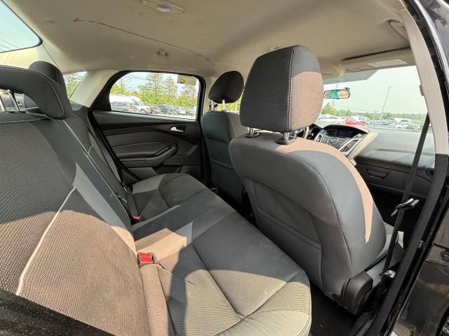 Photo 9 from auction – 2014 FORD FOCUS SE with VIN 1FADP3F20EL434308