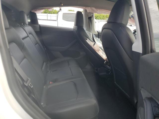 Photo 11 from auction – 2023 TESLA MODEL Y with VIN 7SAYGDEE8PA099768