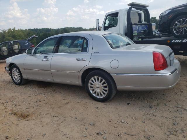 Photo 2 from auction – 2004 LINCOLN TOWN CAR E with VIN 1LNHM81W94Y682713