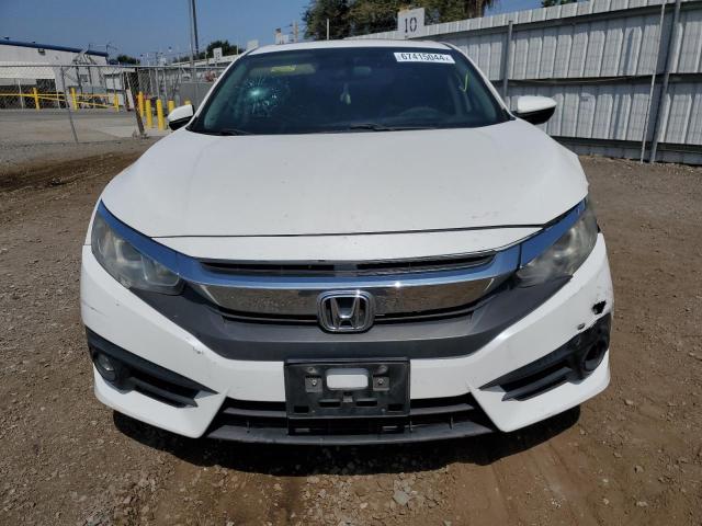 Photo 5 from auction – 2016 HONDA CIVIC EX with VIN 19XFC1F34GE223457