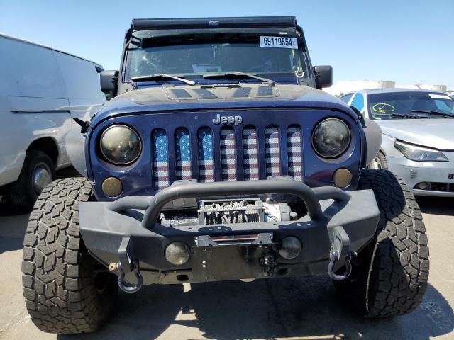 Photo 5 from auction – 2013 JEEP WRANGLER U with VIN 1C4BJWDG0DL629875