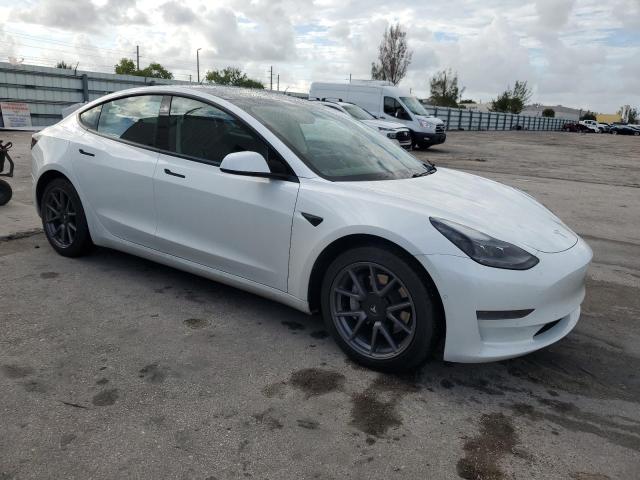 Photo 4 from auction – 2021 TESLA MODEL 3 with VIN 5YJ3E1EA8MF057933