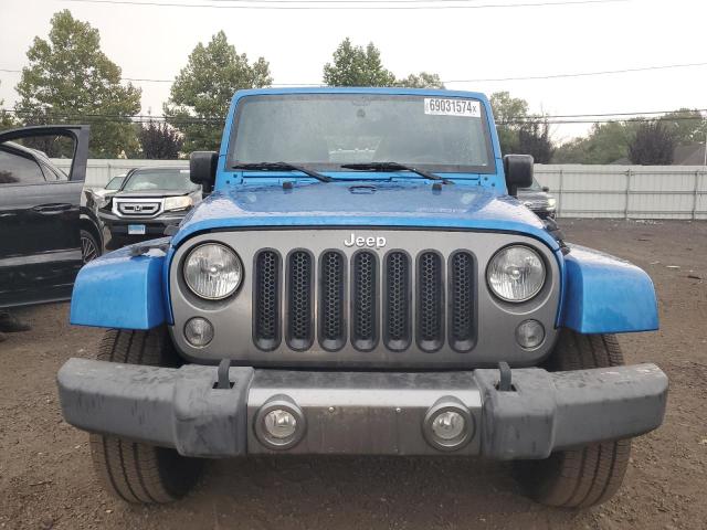 Photo 5 from auction – 2015 JEEP WRANGLER U with VIN 1C4BJWDG9FL589704