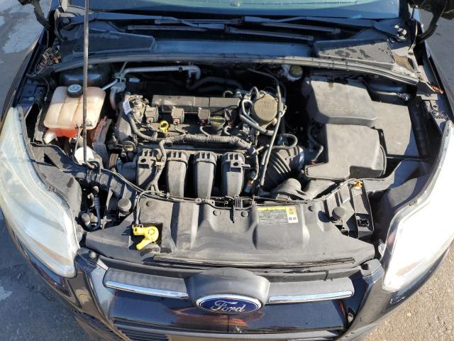 Photo 11 from auction – 2013 FORD FOCUS SE with VIN 1FADP3F23DL348912