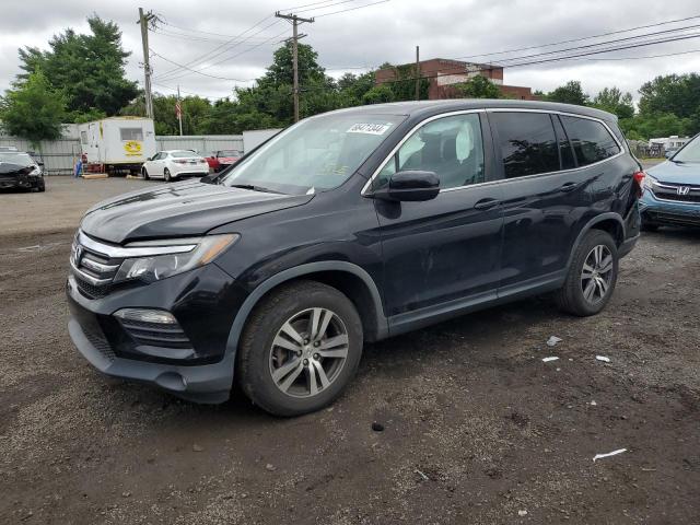 HONDA PILOT EXL 2016 with VIN 5FNYF6H59GB011627 - Photo from auction