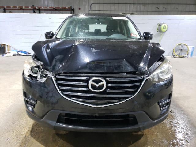 Photo 5 from auction – 2016 MAZDA CX-5 SPORT with VIN JM3KE4BY3G0744388
